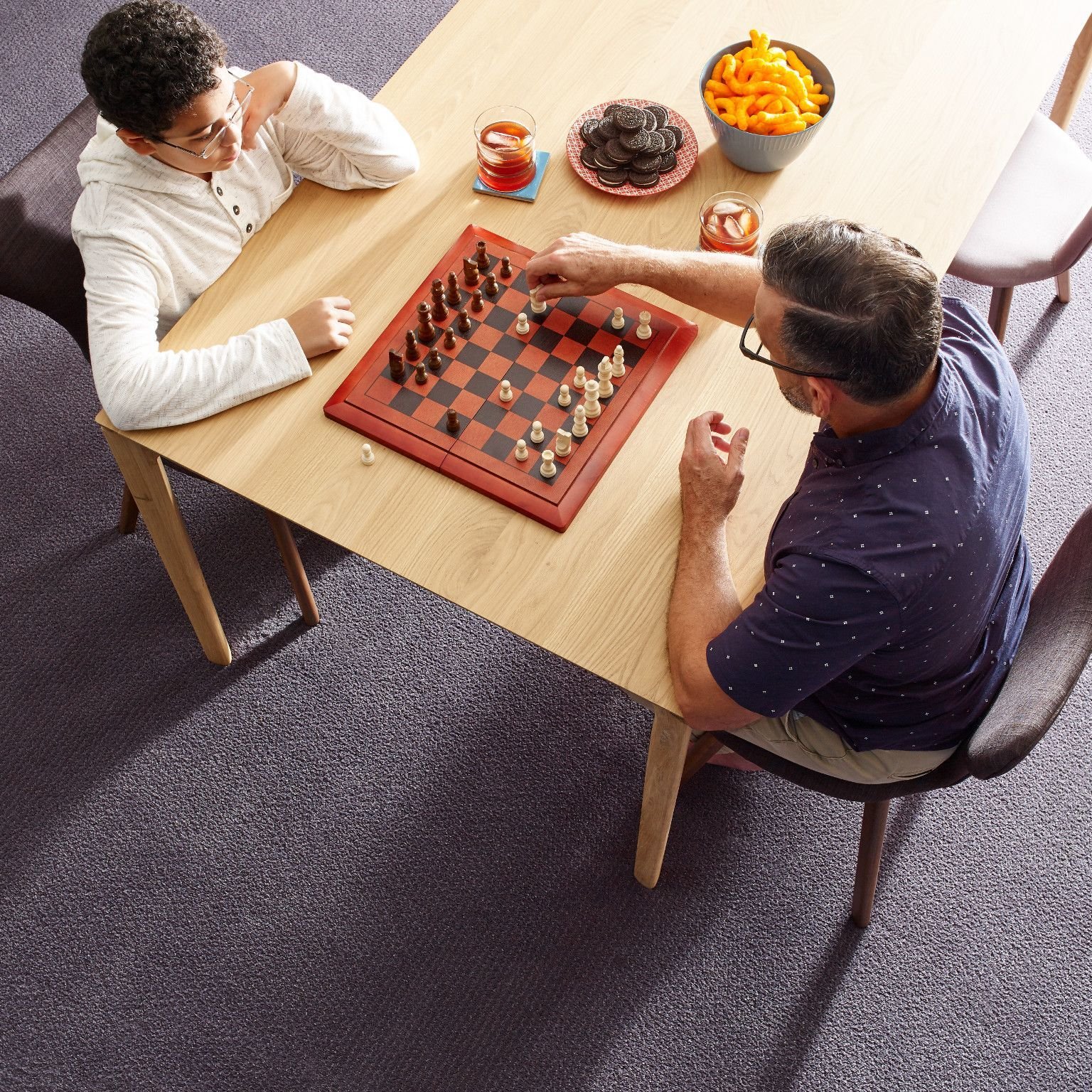 people playing chess from Er Walker Flooring Specialists in Fayetteville, GA