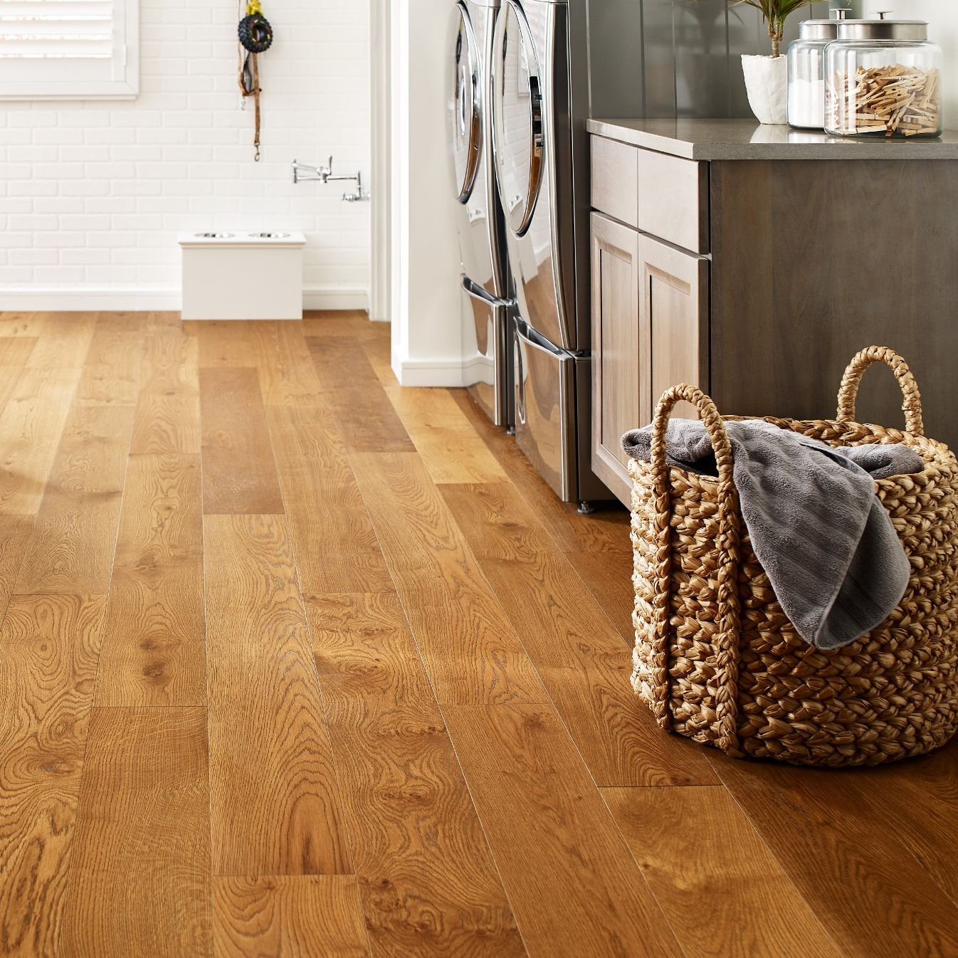 Basket laundry on a brown hardwood from Er Walker Flooring Specialists in Fayetteville