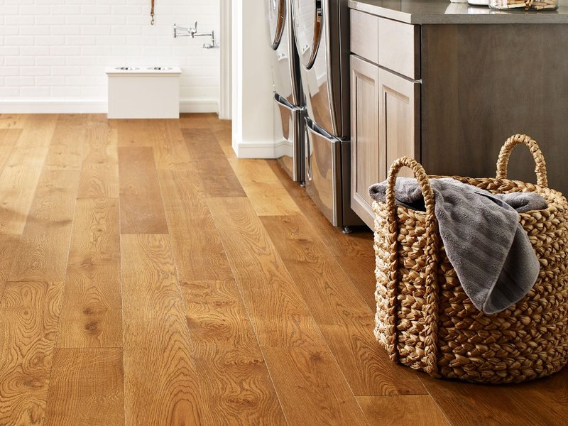 Basket laundry on a brown hardwood from Er Walker Flooring Specialists in Fayetteville